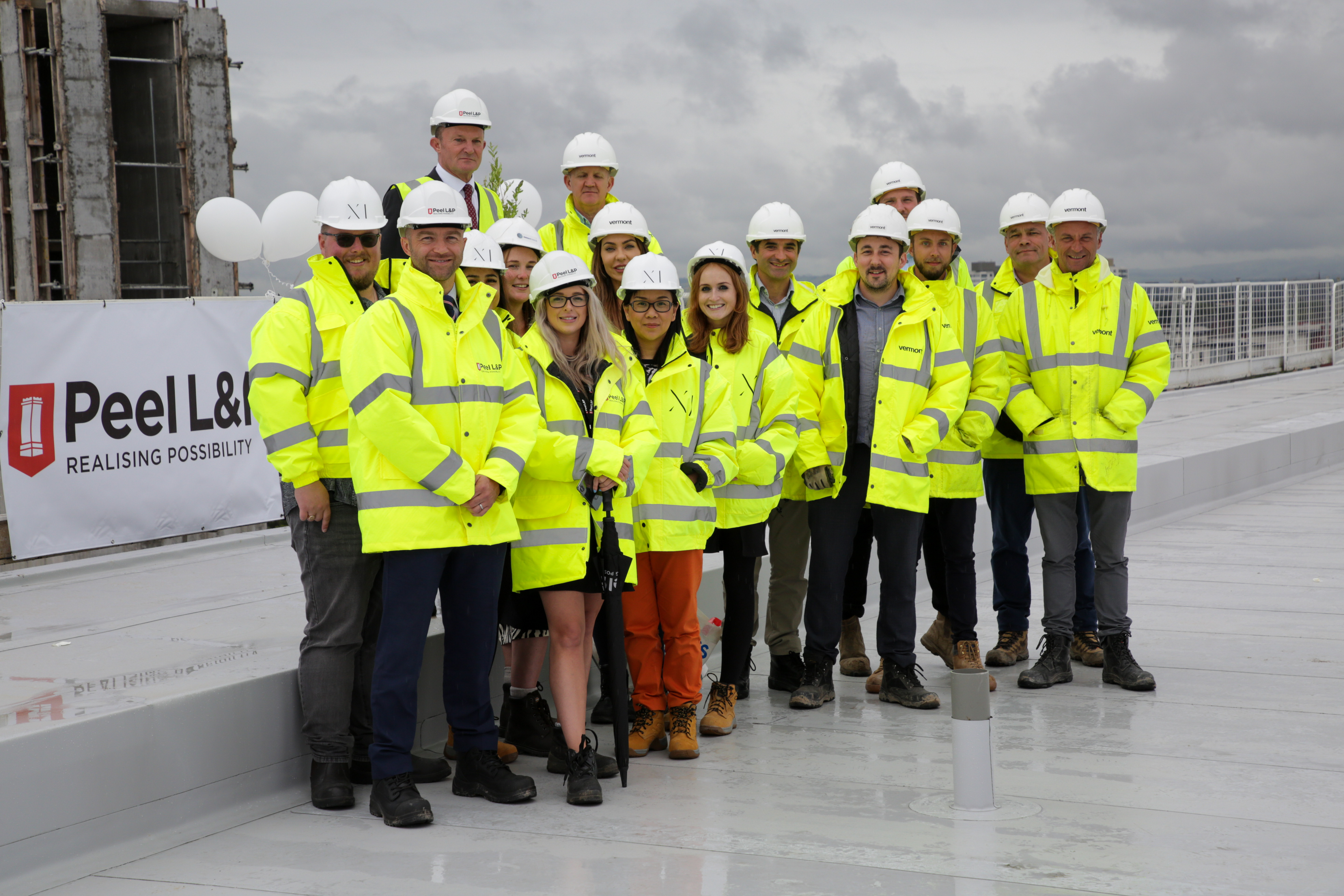 X1 marks the topping out of X1 Manchester Waters